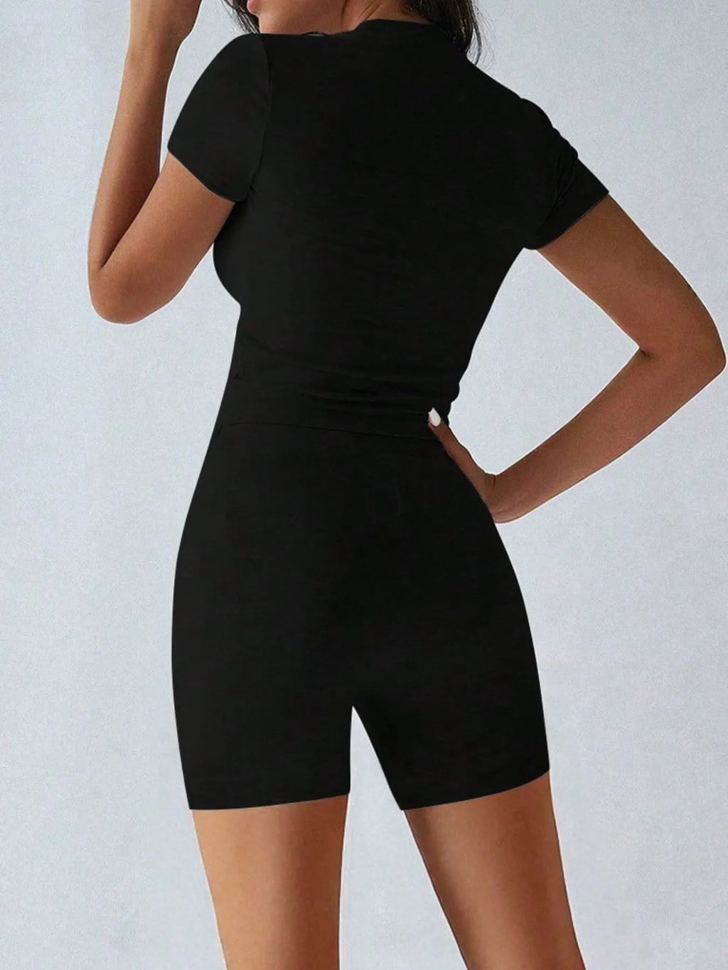 Trendsi active wear set featuring a round neck short sleeve top and matching shorts, perfect for casual or workout outfits.