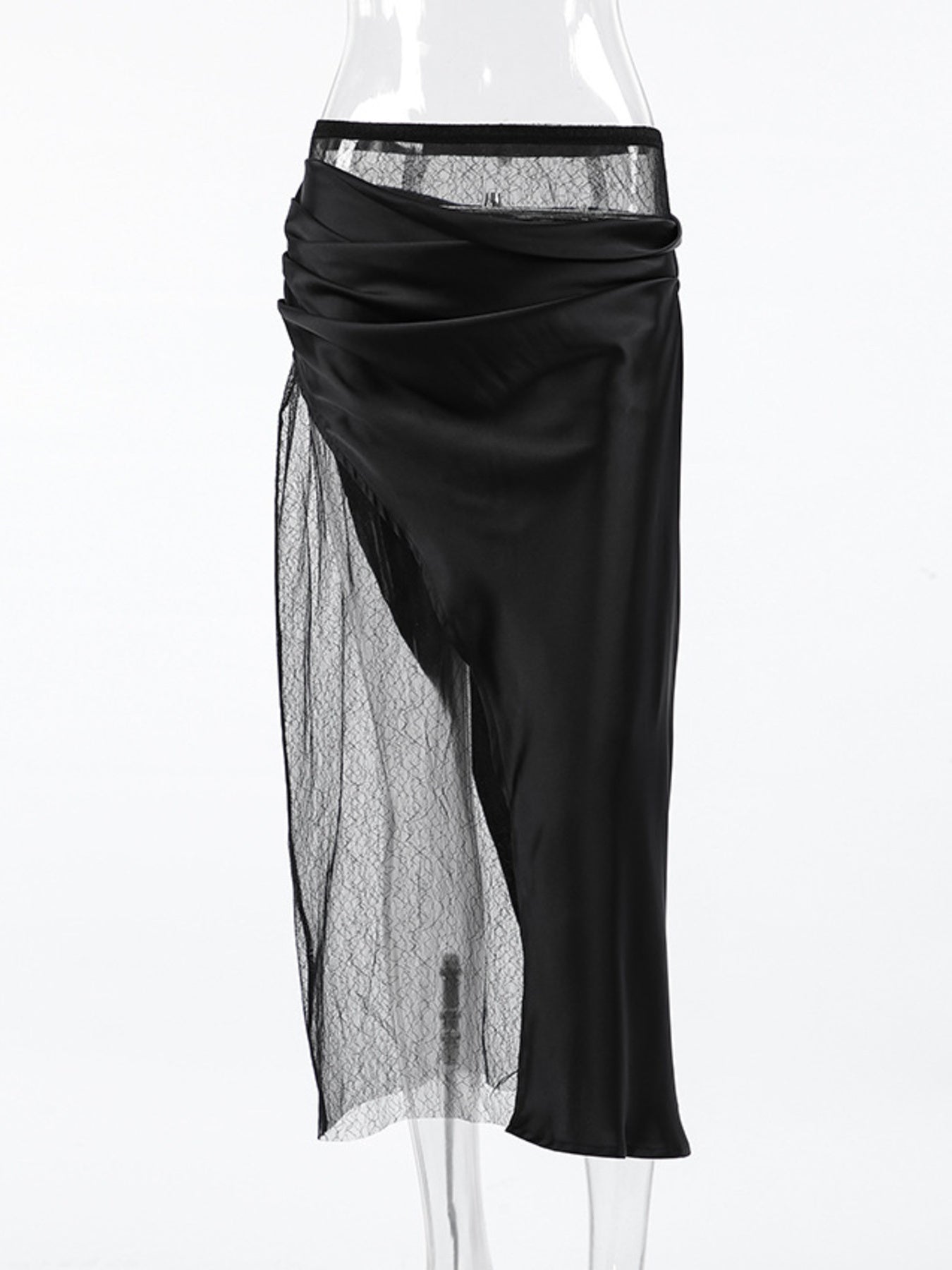 Elegant women's lace midi skirt with sheer split detail, stylish women's apparel by Trendsi, showcasing the flowing fabric and intricate lace pattern.