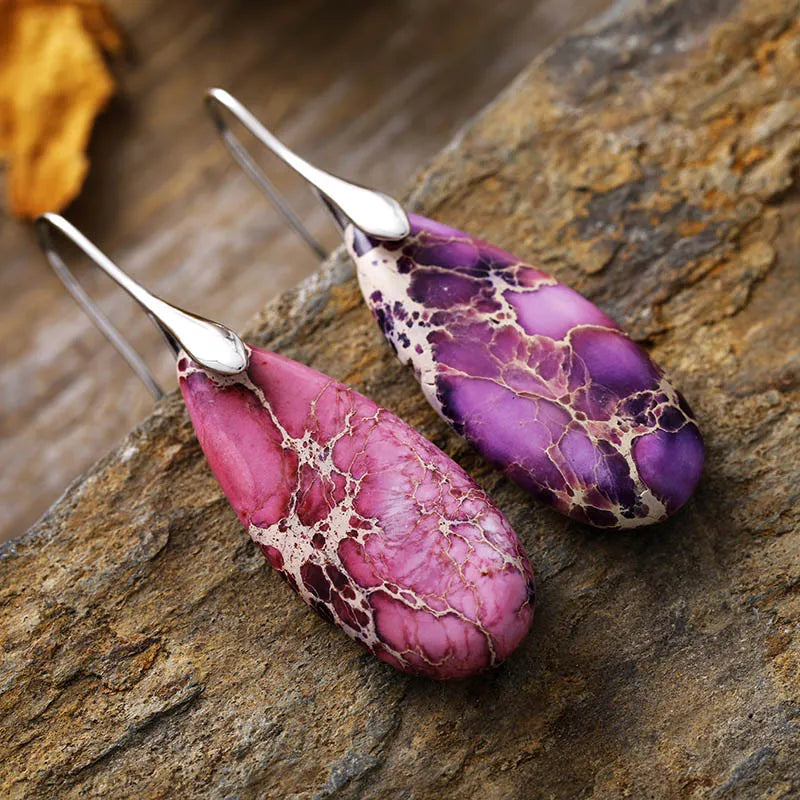 Teardrop-shaped natural stone dangle earrings by Shopimist, featuring elegant jewelry design with polished stones.
