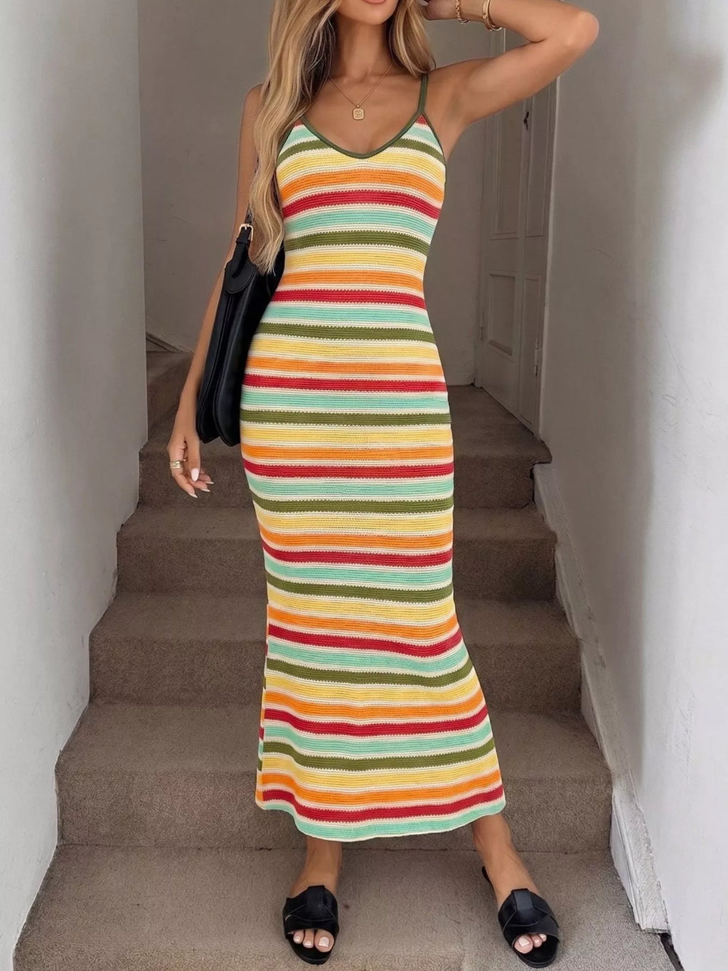 Striped bodycon knit midi dress by Trendsi, showing a fitted dress with bold horizontal stripes and a classic midi length.
