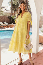 Skyla Sleeve Tiered Midi Dress by Threaded Pear featuring a flowy, tiered design with long sleeves and a midi length.
