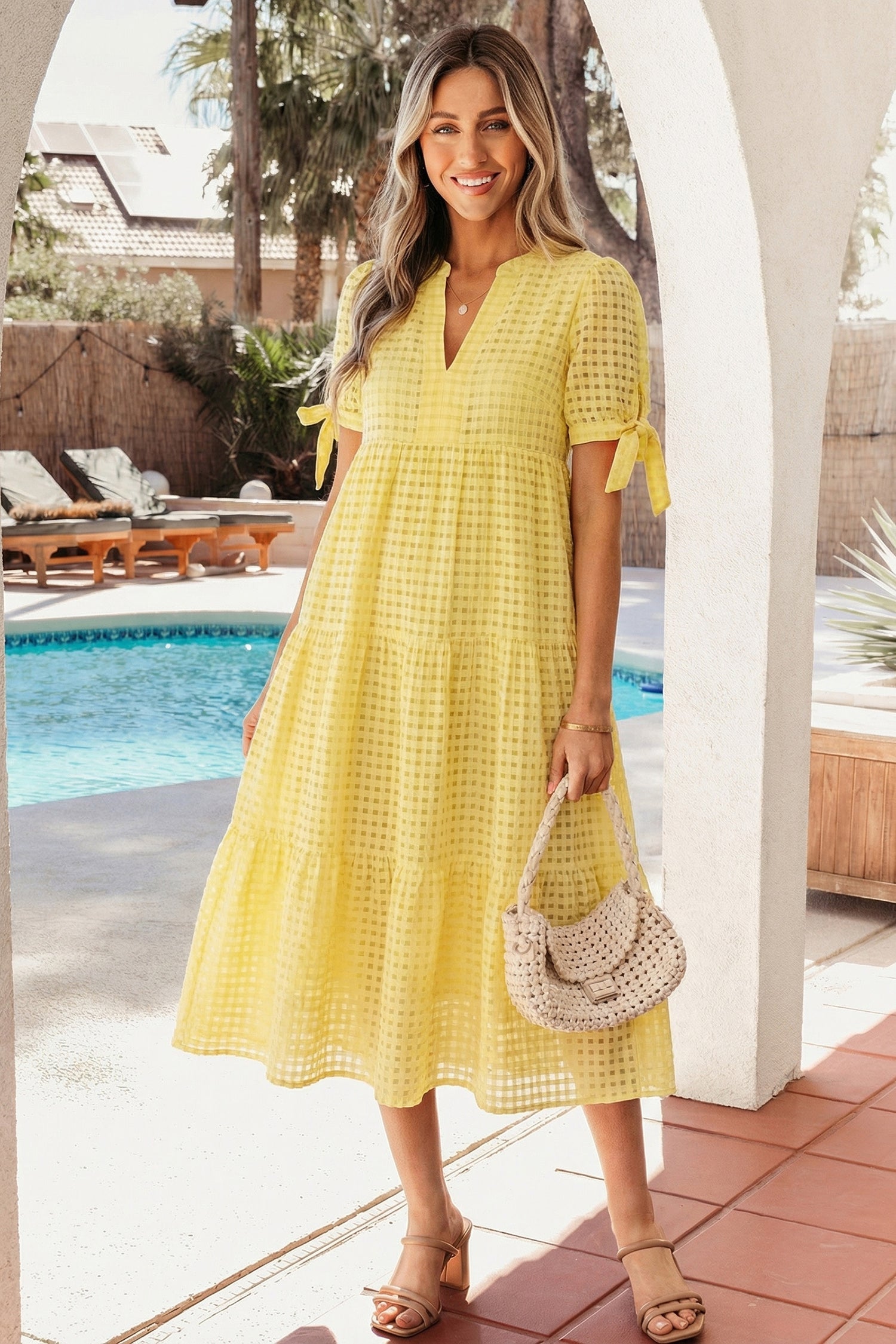Skyla Sleeve Tiered Midi Dress by Threaded Pear featuring a flowy, tiered design with long sleeves and a midi length.