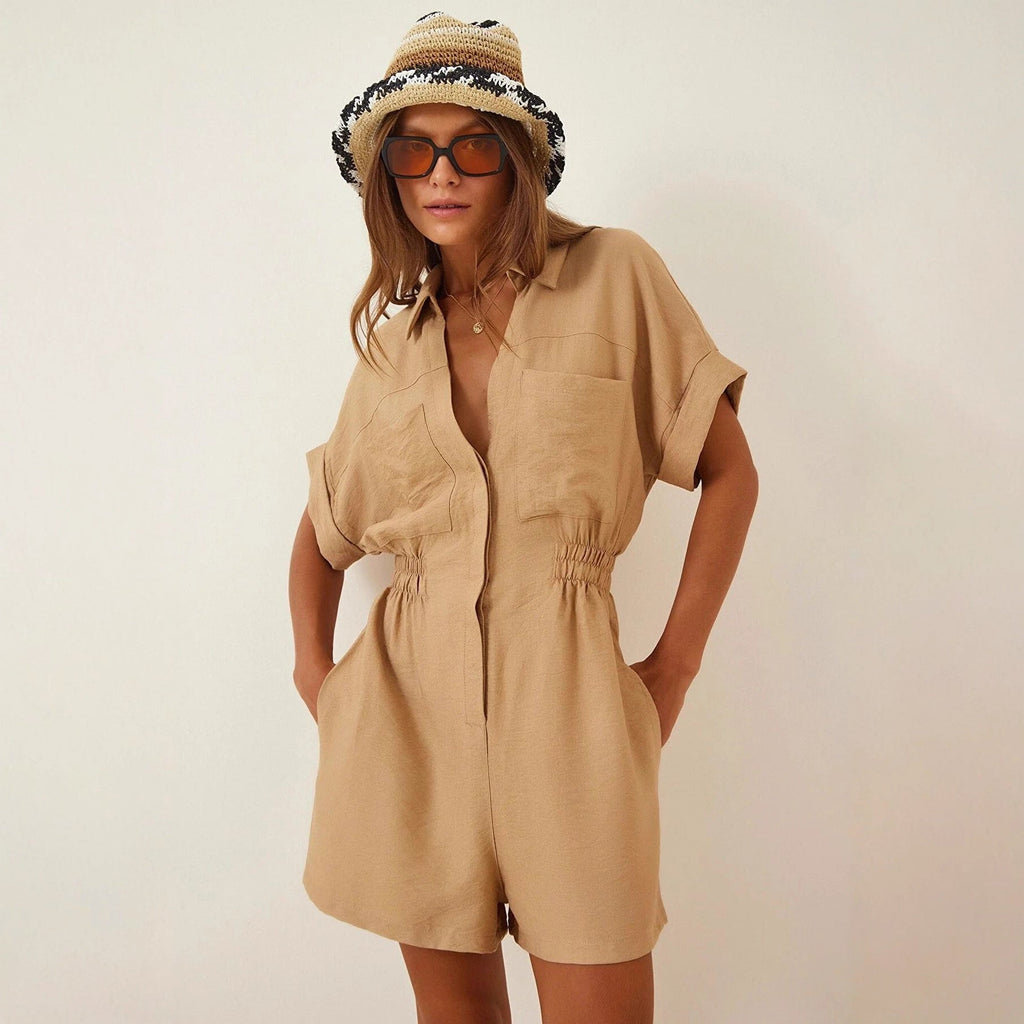 Women's cotton linen loose-fit workwear jumpsuit with pockets, featuring a relaxed style and functional design by FitiqueFit.