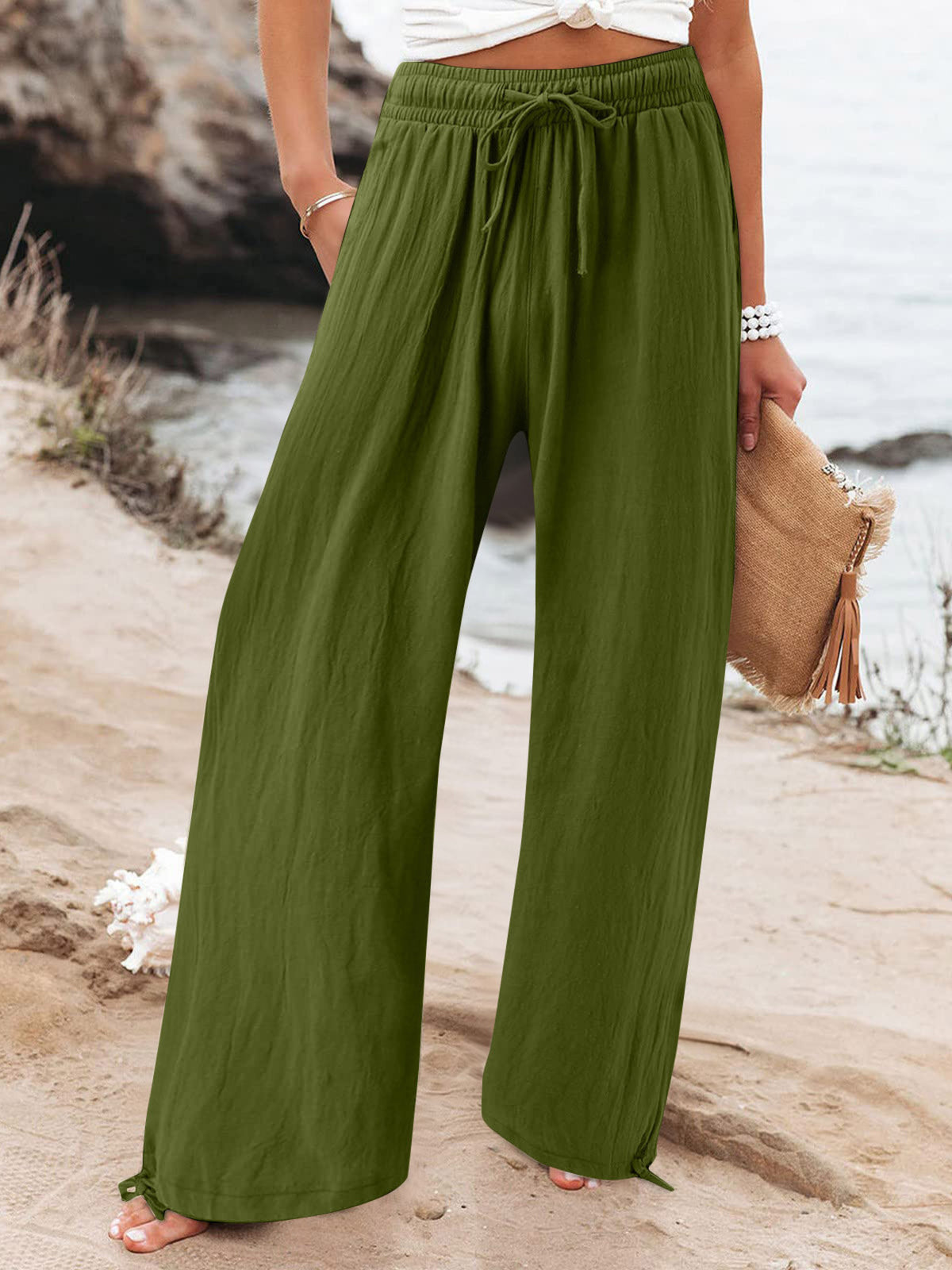 Plus size full length drawstring wide-leg pants from Trendsi, shown in a relaxed fit with a comfortable waistband and flowy silhouette.