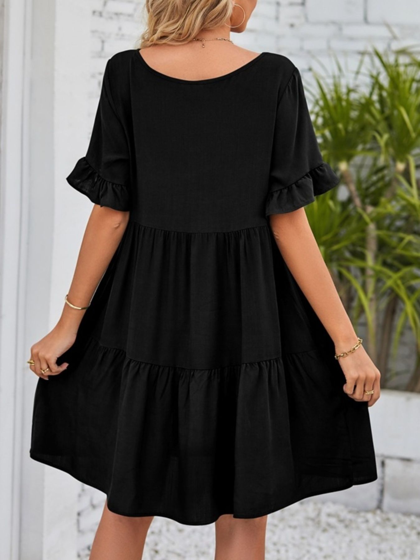 Lightweight rayon ruffled sleeve tiered mini dress with pockets, stylish and flowy, perfect for casual or summer wear.