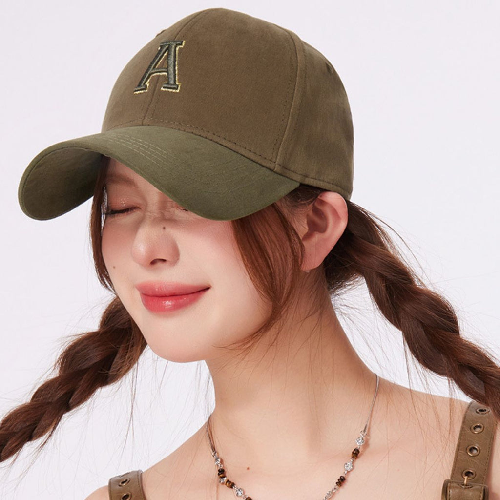 Cotton baseball cap with embroidered letter A in streetwear style, adjustable fit, trendy Trendsi brand hat for casualwear.