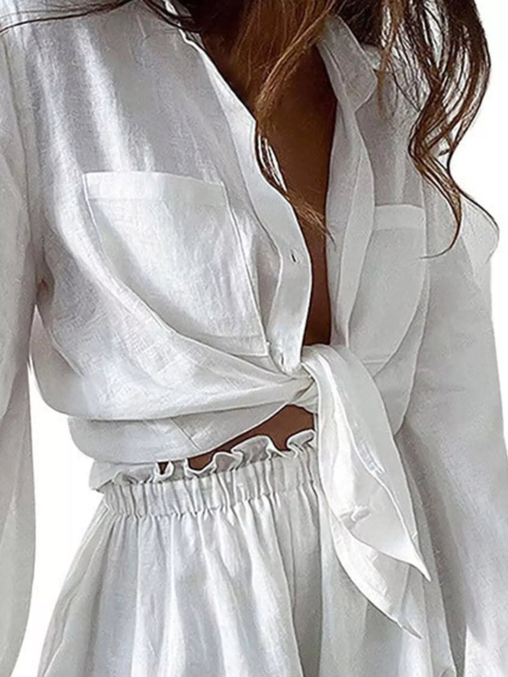 Women's button-up long sleeve shirt and shorts two-piece lounge set by Trendsi, featuring a relaxed fit and casual style.