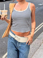 Striped scoop neck tank top from Trendsi, lightweight sleeveless top with black and white horizontal stripes, casual and stylish.