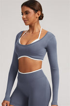 Fitglutes Activewear long sleeve crop top and leggings 2-piece set in stylish workout clothes for gym and fitness activities.
