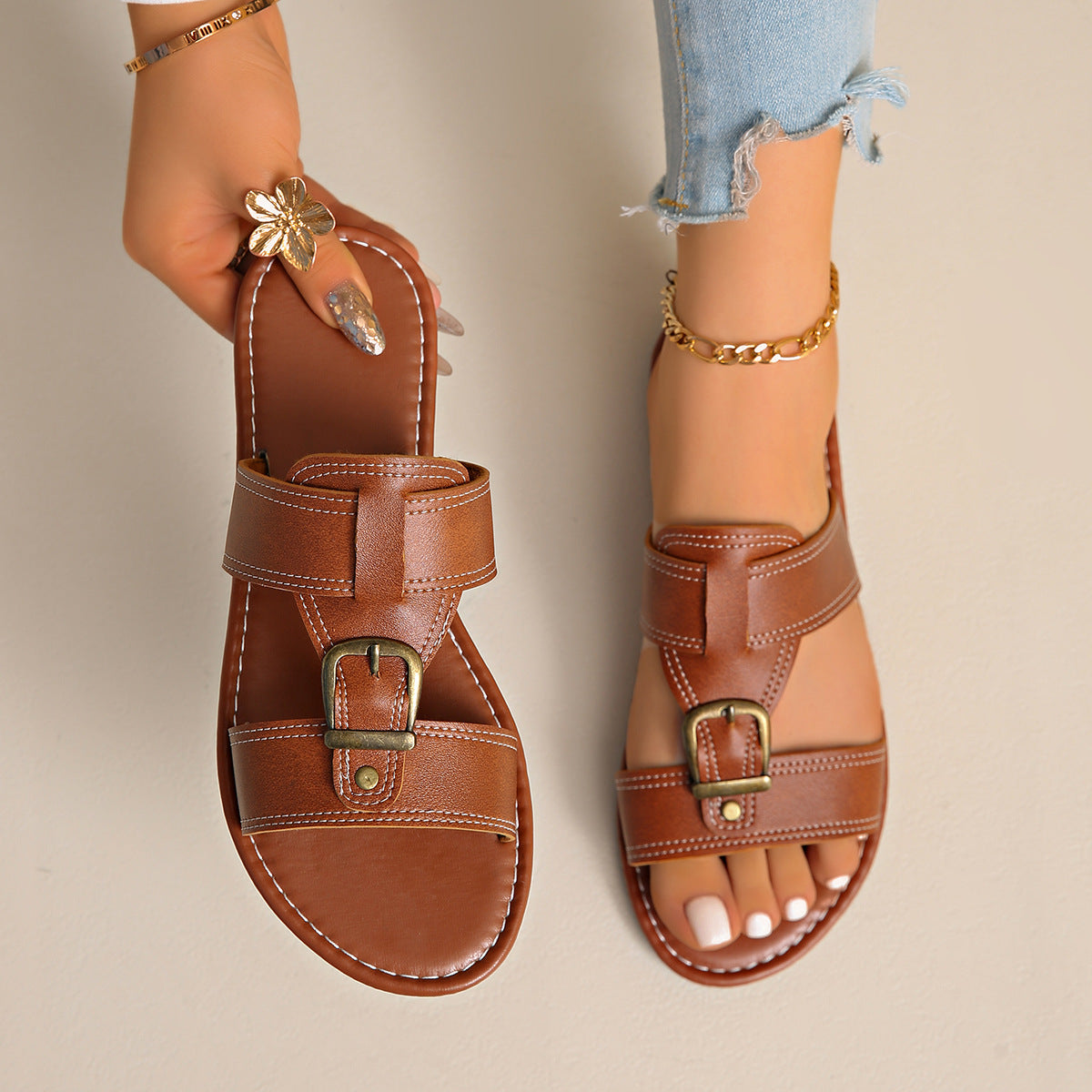 Shopimist buckled leather slide sandals featuring a sleek design and adjustable buckle for comfortable summer wear.
