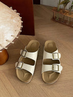 Classic double buckle comfort sandals by Trendsi featuring chic flat PU leather slides, perfect for casual summer wear.