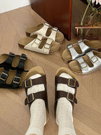 Classic double buckle comfort flat sandals from Trendsi, featuring chic PU leather slides with stylish buckles.
