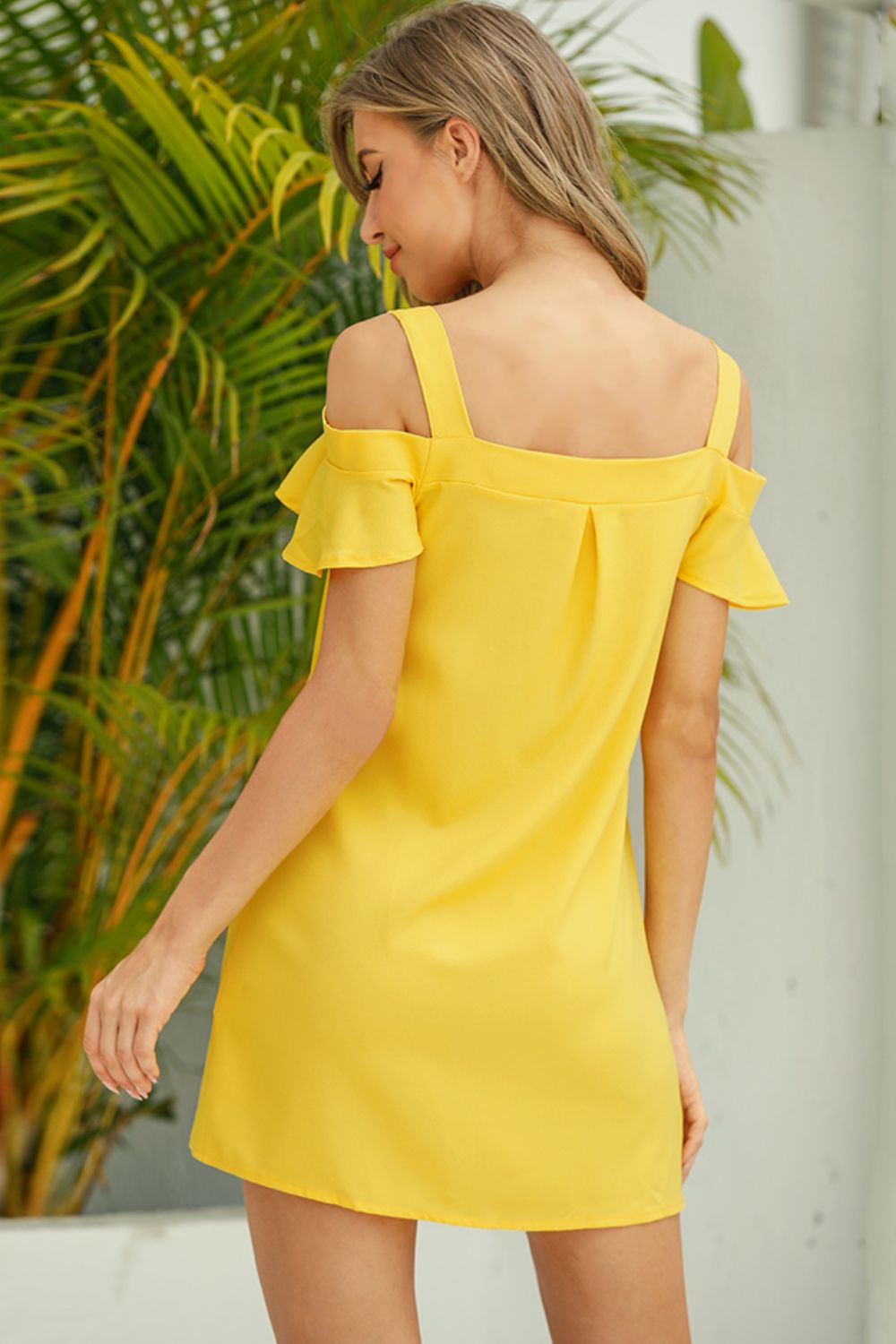 Women's casual cold-shoulder ruffle mini dress in solid color, perfect for summer, by Trendsi.