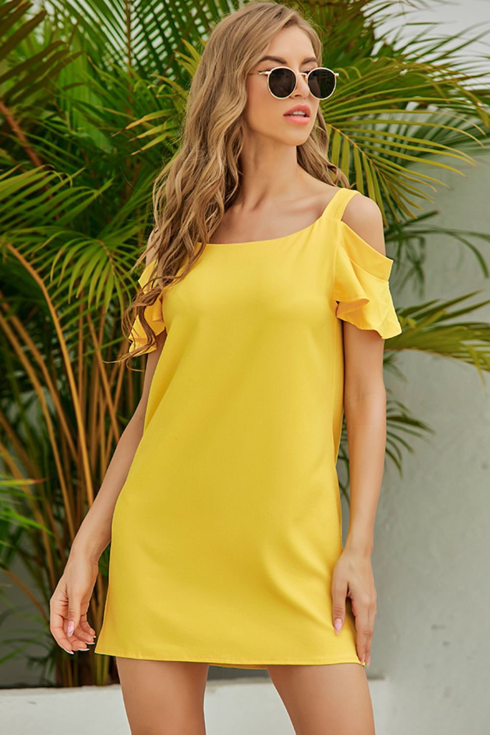 Women’s casual cold-shoulder ruffle mini dress in a solid color, perfect for summer, by Trendsi.
