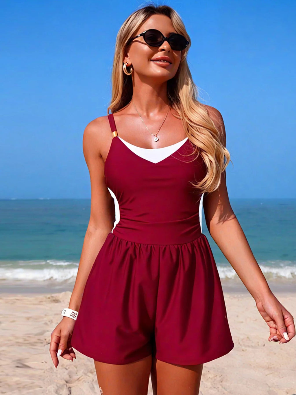 Color block adjustable strap one-piece swimsuit for women, stylish swimwear from Trendsi featuring vibrant color blocking.