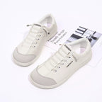 Contrast lace-up casual sneakers by Trendsi, featuring PU leather and canvas design with stylish flats and comfortable fit.