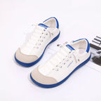Contrast lace-up casual sneakers made of PU leather and canvas, featuring a stylish, comfortable shoe design from Trendsi.