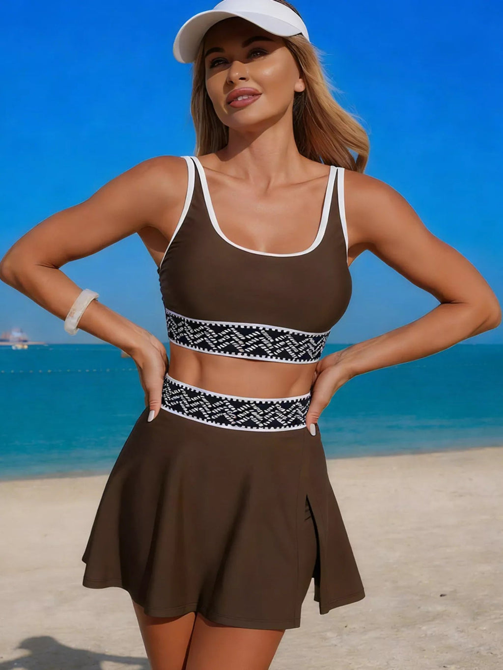 Contrast trim tank top and skort swim set by Trendsi, stylish two-piece swimwear with contrasting edging and comfortable fit.