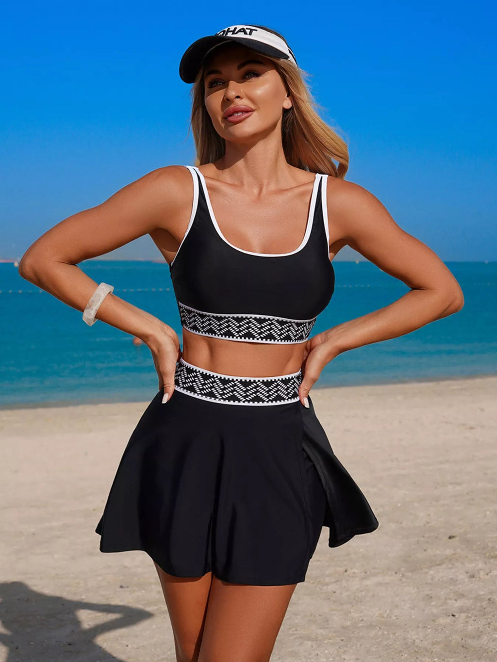 Contrast trim tank top and skort swim set by Trendsi, stylish two-piece swimwear featuring a tank top and matching skort.