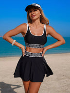Contrast trim tank top and skort swim set by Trendsi, stylish two-piece swimwear featuring a tank top and matching skort.