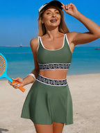 Contrast trim tank top and skort swim set by Trendsi, stylish two-piece swimwear featuring a tank top and matching skort.
