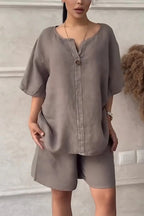 Cotton-linen shirt set with high-waisted loose shorts for women, featuring a relaxed fit and casual summer style.