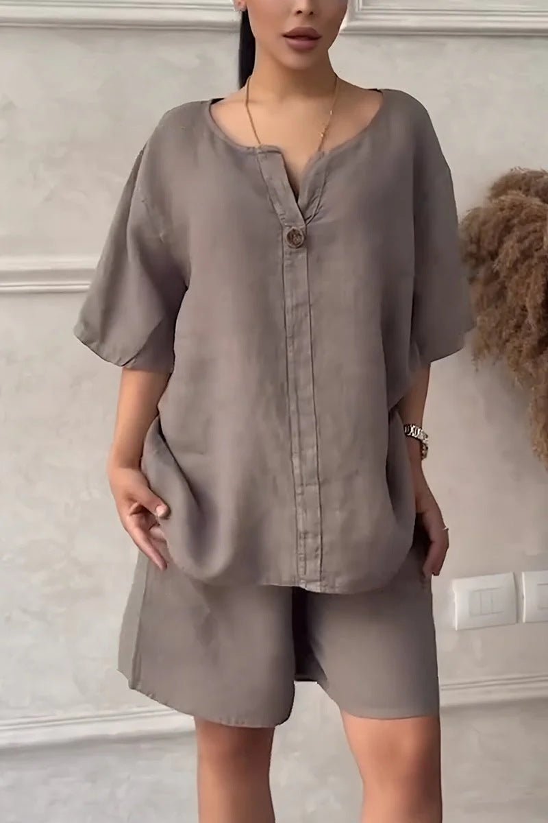 Cotton-linen shirt set with high-waisted loose shorts for women, featuring a relaxed fit and casual summer style.