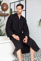 Absorbent, lightweight cotton waffle spa bathrobe for men by Plush Fashion Hub, showing the soft textured fabric and relaxed fit.