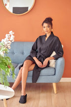 Knee-length waffle robe for women by Plush Fashion Hub, made of soft cotton, featuring a cozy, textured waffle pattern.