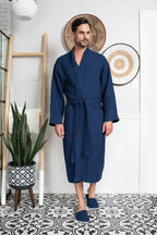 Absorbent, lightweight men's waffle spa bathrobe made of cotton, featuring a plush texture and comfortable fit.