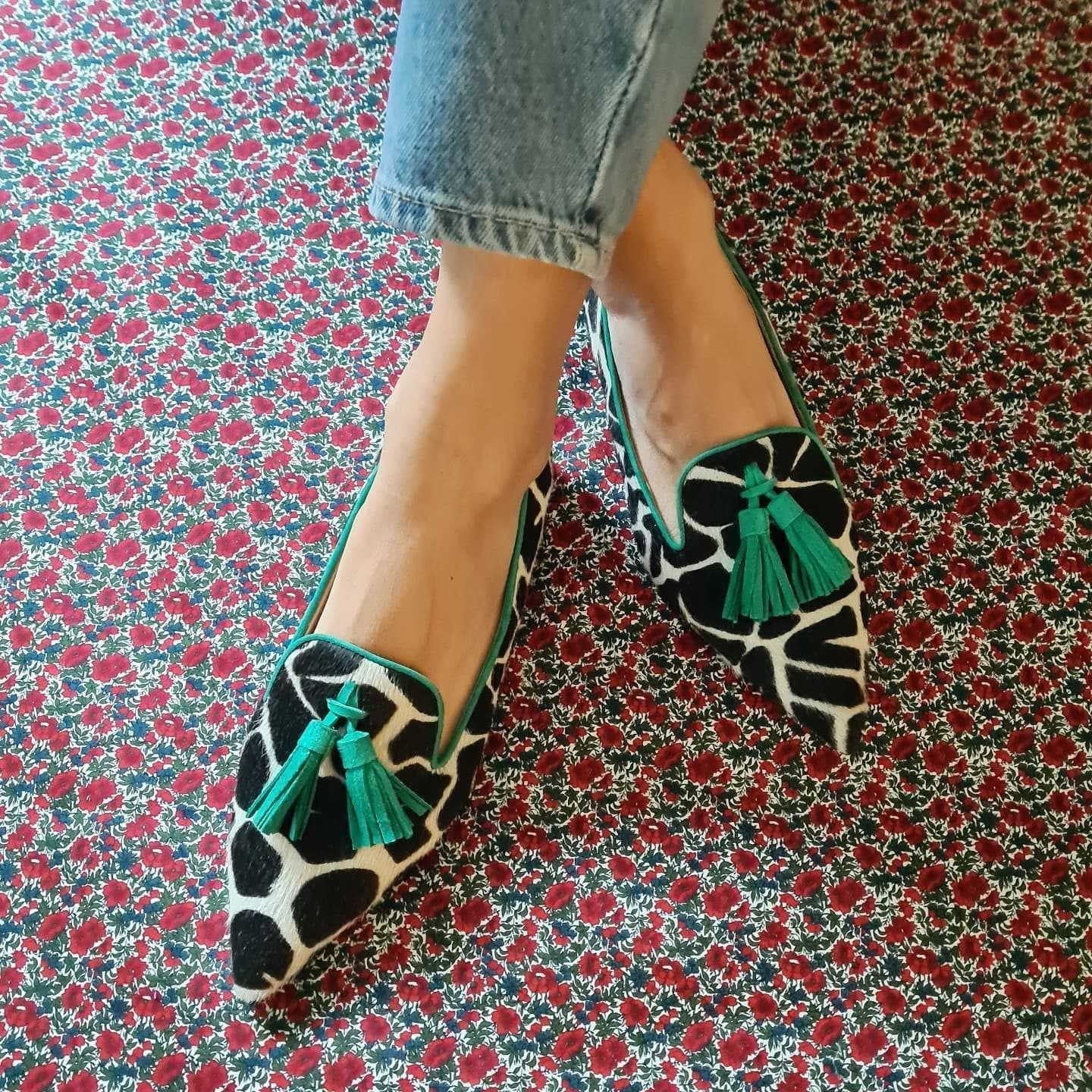 Cow print tassel pumps for women by Plush Fashion Hub, casual slip-on footwear with stylish tassel details and comfortable design.