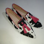 Cow print tassel pumps for women by Plush Fashion Hub, casual slip-on footwear with stylish cow-print and tassel details.