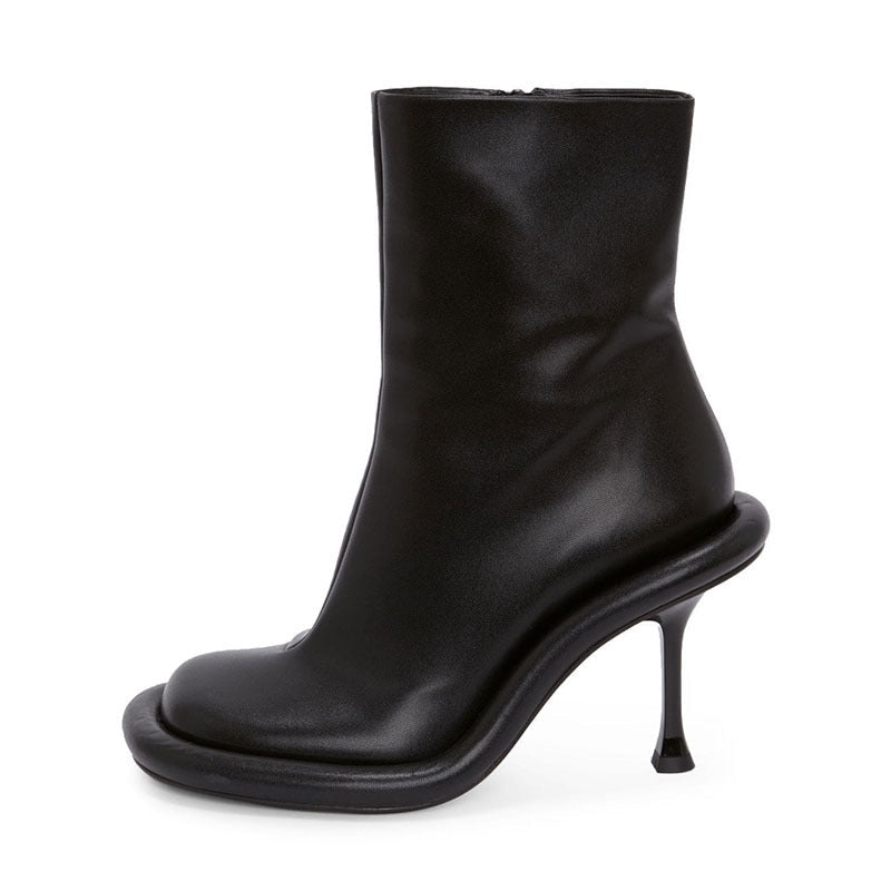 Plush Fashion Hub cowboy round toe high heels boots with Western-inspired design, featuring a sleek leather finish and decorative stitching.