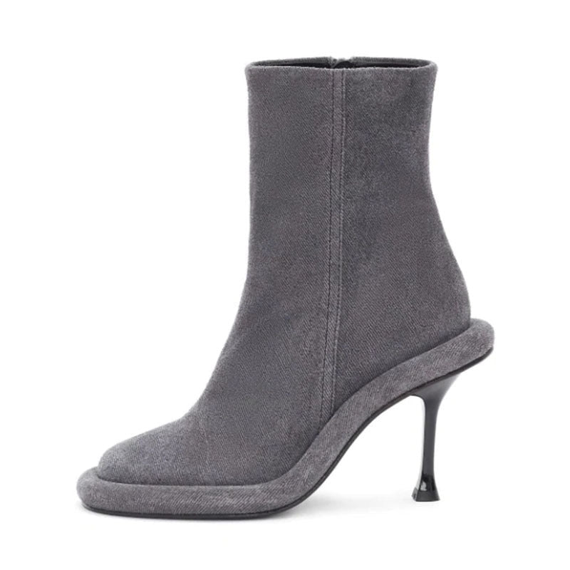 Plush Fashion Hub cowboy round toe high heels boots with leather finish and Western-inspired design, featuring a stacked heel.