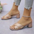 Women's crisscross PU leather block heel sandals with stylish mid-heel design, featuring a sleek strap detail and comfortable sole.