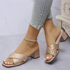 Women's crisscross PU leather block heel sandals with stylish mid-heel design, showcasing beige straps and a comfortable sole.