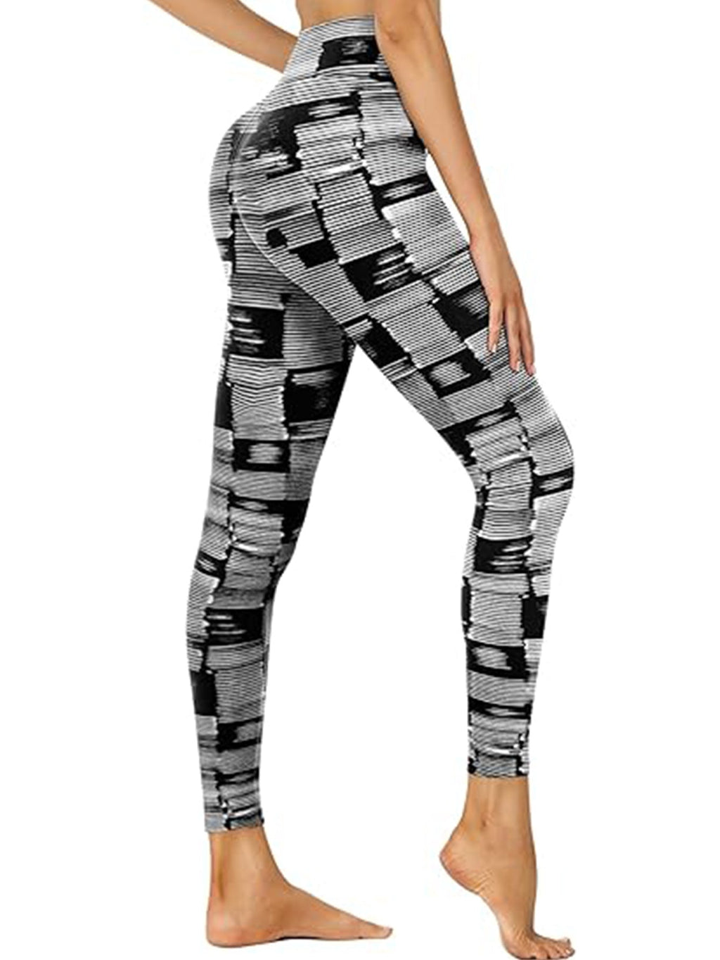 Black and white barcode print cropped high-waisted activewear leggings by Plush Fashion Hub, shown on a model.
