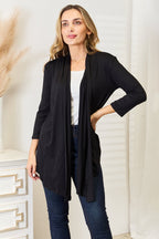 Women's lightweight draped open front cardigan with 3/4 sleeves, casual women's apparel by Trendsi.