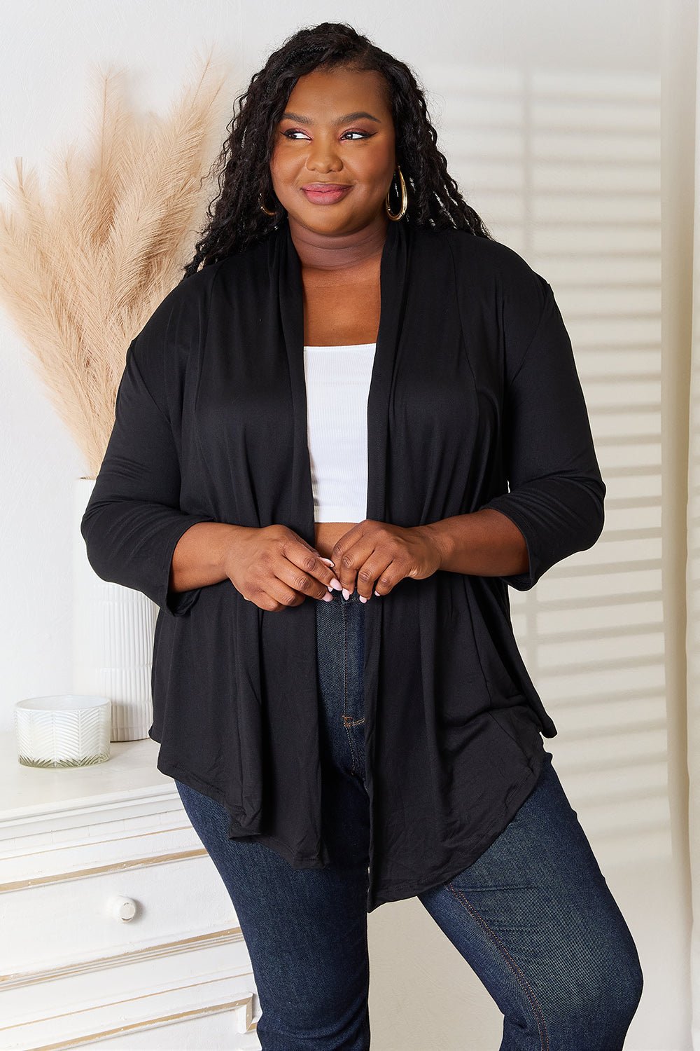 Women's draped open front cardigan with 3/4 sleeves, lightweight and stylish, from Trendsi, perfect for layered casual wear.