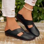Women's trendy faux leather cutout flat sandals by Trendsi, featuring open-toe design and comfortable summer footwear style.