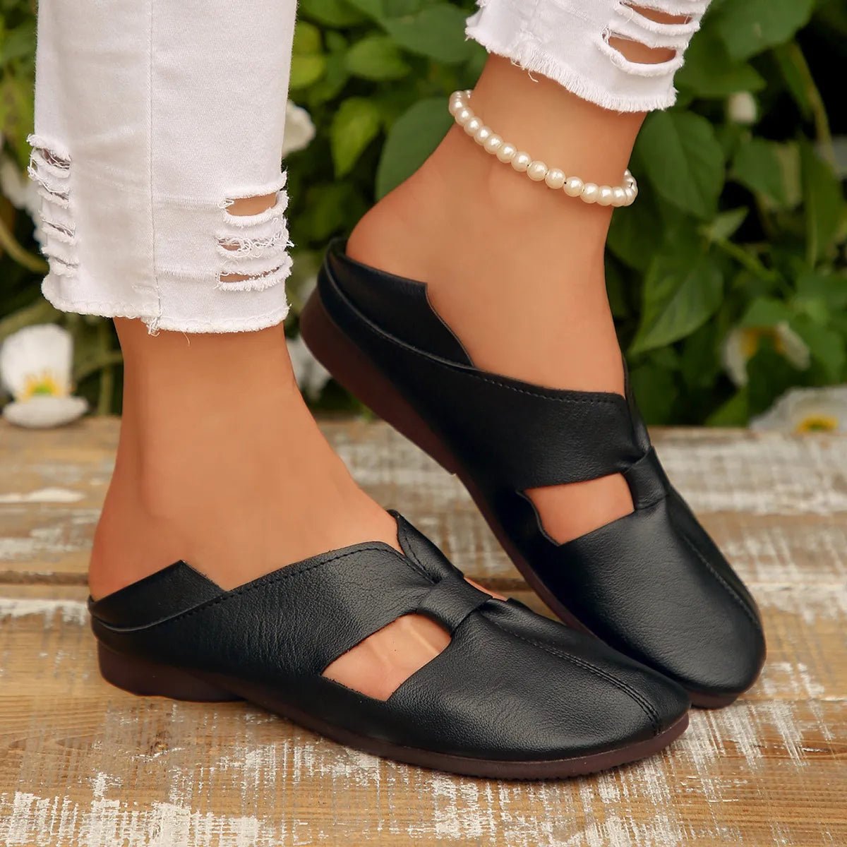 Women's trendy faux leather cutout flat sandals by Trendsi, featuring open-toe design and comfortable summer footwear style.