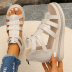 Women's rhinestone cutout wedge sandals by Trendsi featuring sparkling embellishments and comfortable design for stylish wear.