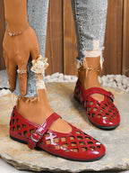 Women's vegan leather flat sandals with cutout design and round toe from Trendsi, perfect for comfortable everyday wear.