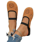Women's slip-on flats with round toe and cutout design made from premium PU leather, stylish and comfortable shoe by Trendsi.