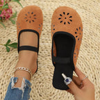 Women's slip-on flats with cutout details and round toe in premium PU leather, stylish and comfortable shoe by Trendsi.