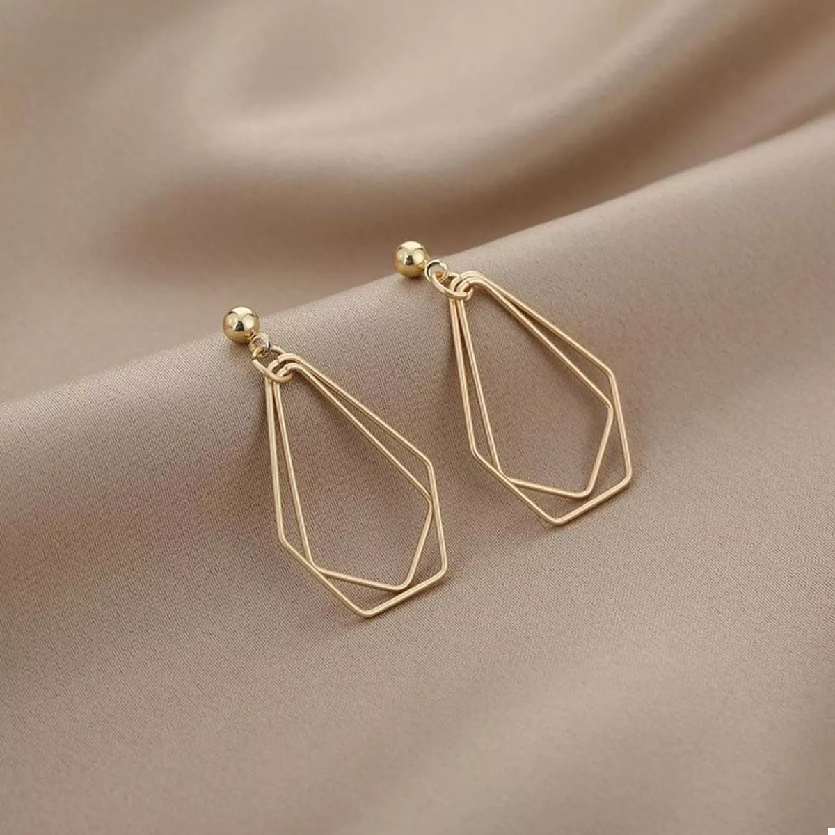 18K gold-plated alloy geometric wire drop earrings with modern design, featuring sleek, minimalist shapes for stylish wear.