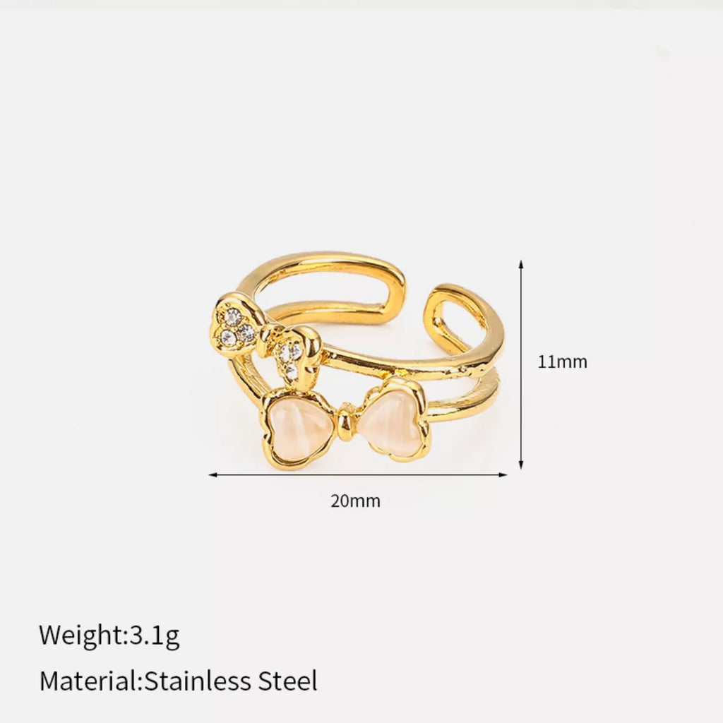 18K gold-plated bow open ring from Shopimist featuring a delicate, elegant design on a white background