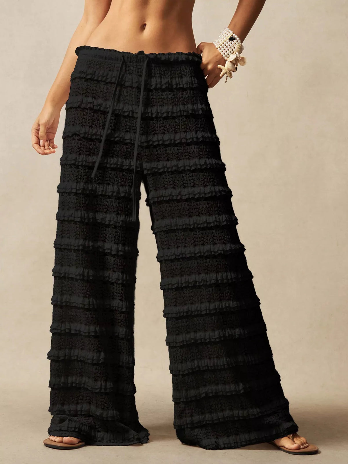 Lace drawstring wide-leg pants by Plush Fashion Hub, showing flowy fabric and relaxed fit in a stylish design.