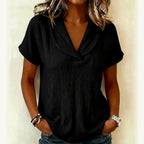 Women's knitted short-sleeve butterfly collar top from Plush Fashion Hub, casualwear with a stylish butterfly neckline.