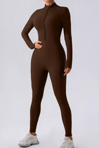 Trendsi women's half zip mock neck active jumpsuit in black, form-fitting athletic wear with long sleeves and sleek design.